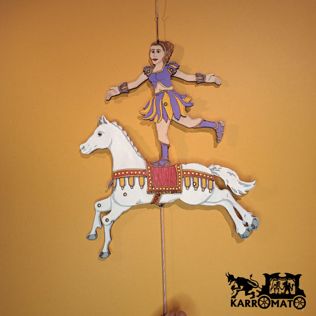 Handmade wooden Jumping Jack clown puppet by Karromato